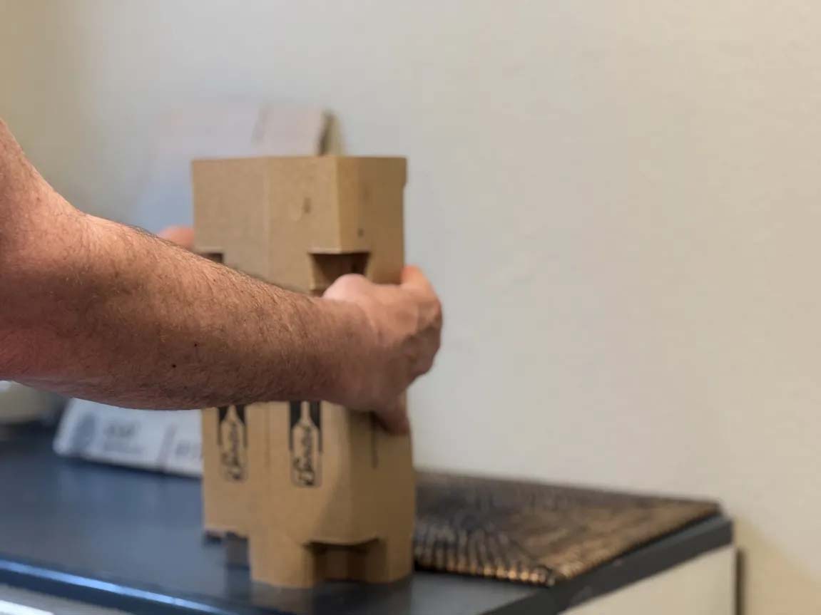 Securing bottles with tabs