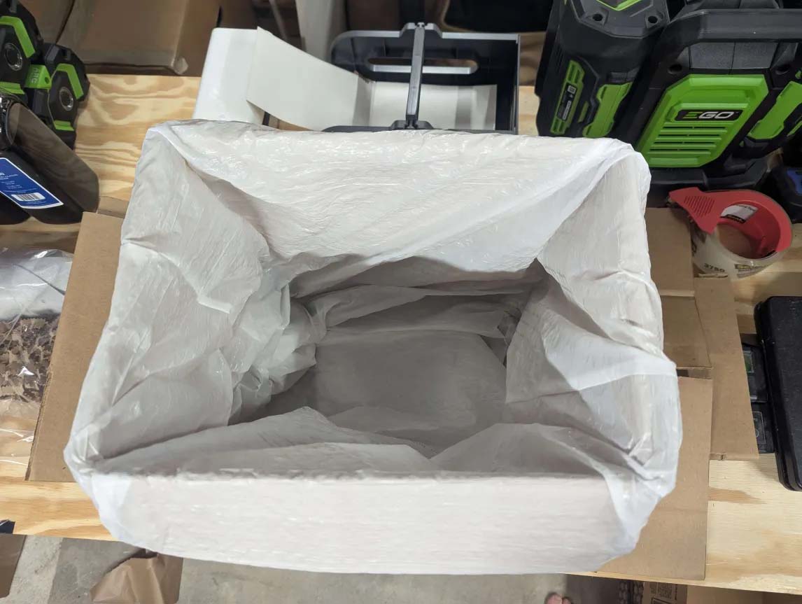 Trash bag lining inside box